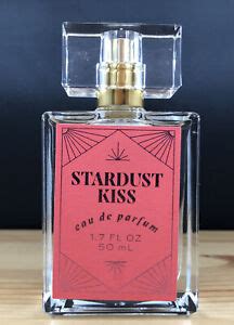 Top notes are Cherry, Strawberry and Orange Peel; middle notes are Red Freesia, Peony and Passion Flower; base notes are Sugar, Musk and Sandalwood. . Stardust kiss perfume